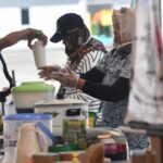 umkm pertamina - ilustrasi berita Ekonomi Bergeliat: UMKM Pertamina Panen Rezeki di MRS 2026